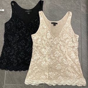 1 cream and 1 black lacy tank tops.